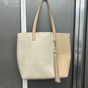Cream tote bag with tassel